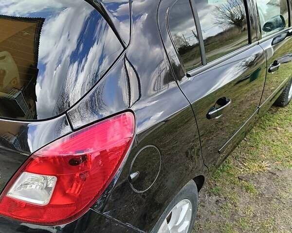 Чорний Опель Корса, об'ємом двигуна 1.25 л та пробігом 235 тис. км за 4599 $, фото 4 на Automoto.ua