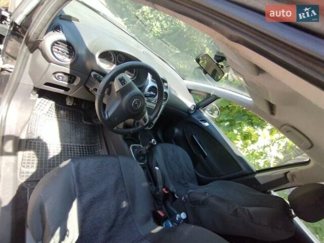 Черный Опель Корса, объемом двигателя 1.2 л и пробегом 177 тыс. км за 4900 $, фото 10 на Automoto.ua