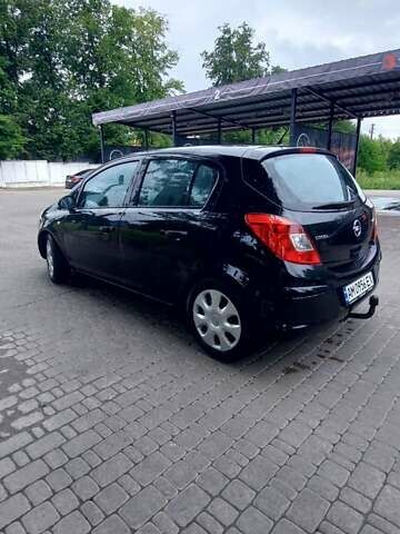 Черный Опель Корса, объемом двигателя 1.25 л и пробегом 218 тыс. км за 5800 $, фото 1 на Automoto.ua
