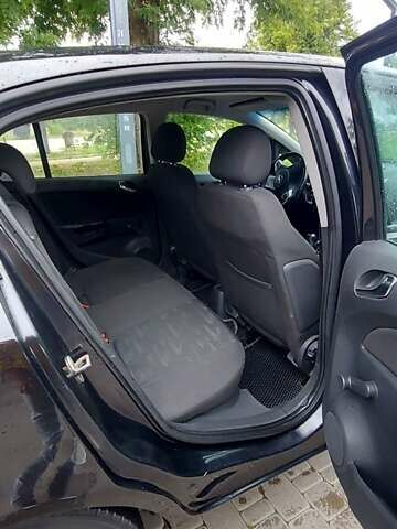 Черный Опель Корса, объемом двигателя 1.25 л и пробегом 218 тыс. км за 5800 $, фото 19 на Automoto.ua