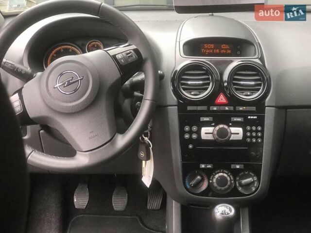 Черный Опель Корса, объемом двигателя 1.3 л и пробегом 174 тыс. км за 6150 $, фото 10 на Automoto.ua
