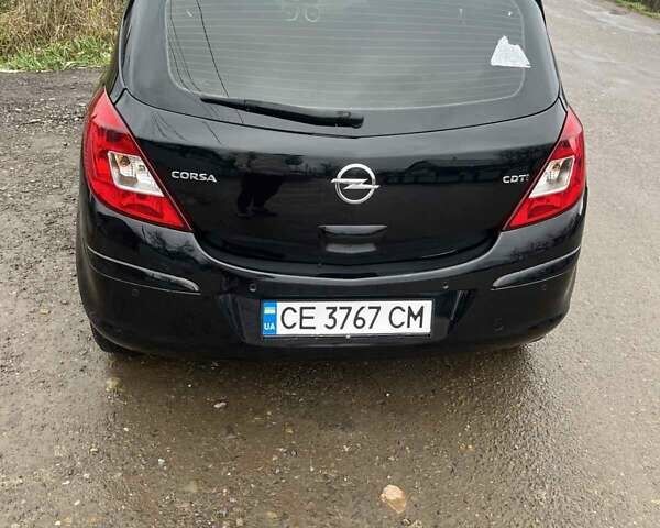 Чорний Опель Корса, об'ємом двигуна 1.25 л та пробігом 161 тис. км за 5000 $, фото 7 на Automoto.ua