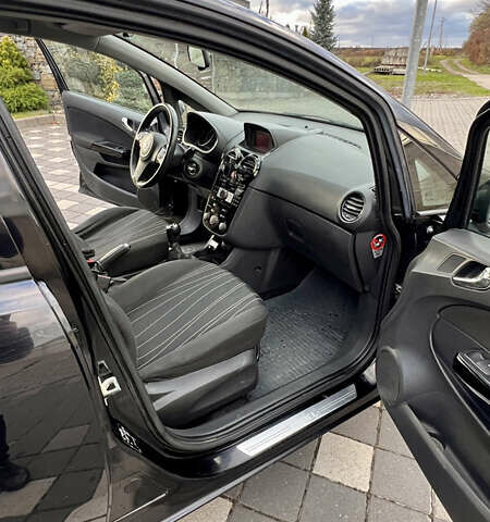 Чорний Опель Корса, об'ємом двигуна 1.23 л та пробігом 239 тис. км за 4599 $, фото 17 на Automoto.ua