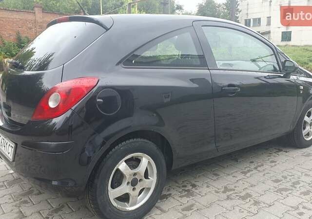Чорний Опель Корса, об'ємом двигуна 1.23 л та пробігом 255 тис. км за 4200 $, фото 4 на Automoto.ua