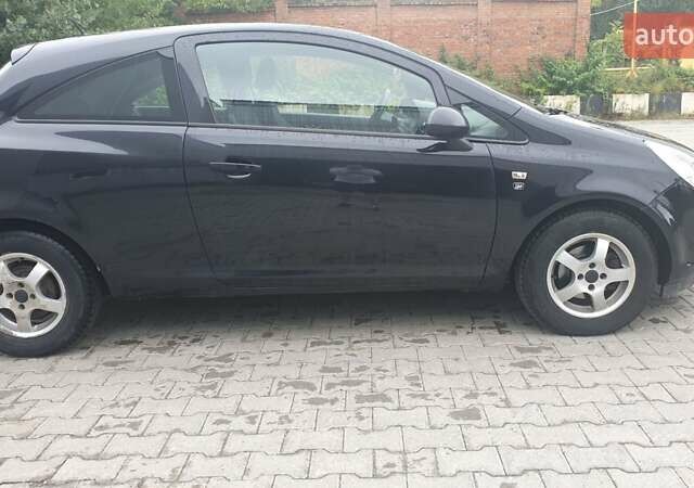 Чорний Опель Корса, об'ємом двигуна 1.23 л та пробігом 255 тис. км за 4200 $, фото 8 на Automoto.ua