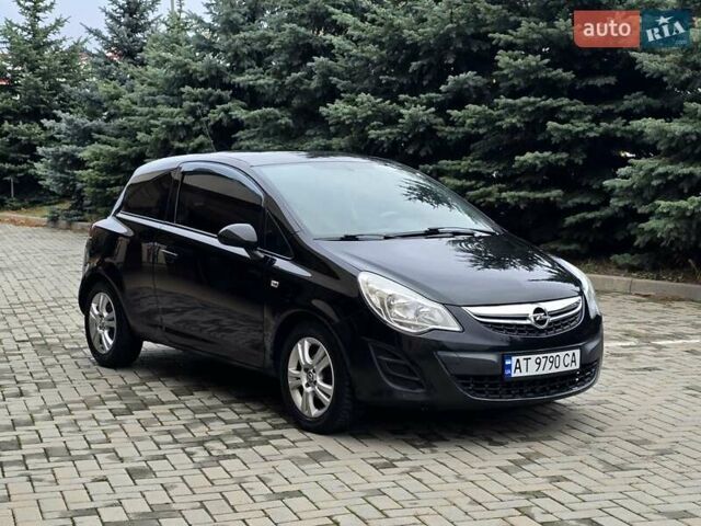 Черный Опель Корса, объемом двигателя 1.25 л и пробегом 134 тыс. км за 3900 $, фото 11 на Automoto.ua
