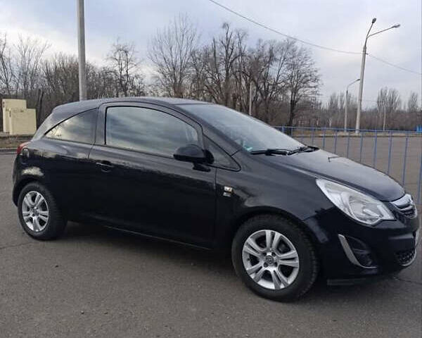 Черный Опель Корса, объемом двигателя 1.4 л и пробегом 210 тыс. км за 5550 $, фото 1 на Automoto.ua