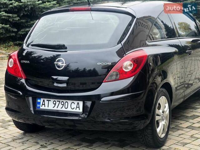 Черный Опель Корса, объемом двигателя 1.25 л и пробегом 134 тыс. км за 3900 $, фото 8 на Automoto.ua