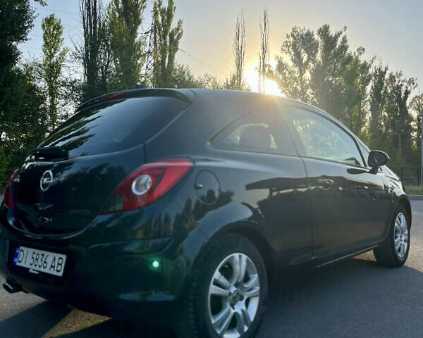 Черный Опель Корса, объемом двигателя 1.4 л и пробегом 210 тыс. км за 5550 $, фото 10 на Automoto.ua