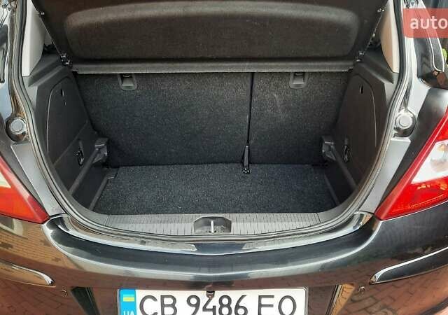 Черный Опель Корса, объемом двигателя 1.4 л и пробегом 142 тыс. км за 7400 $, фото 7 на Automoto.ua