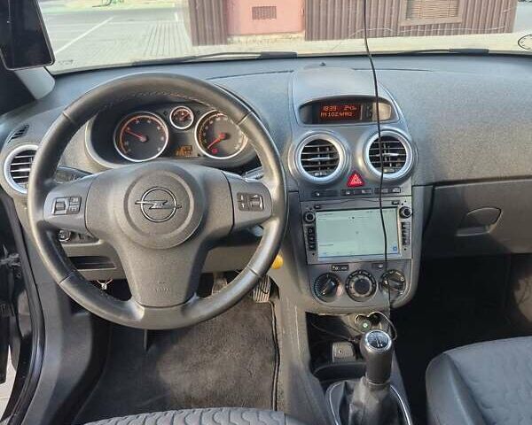 Черный Опель Корса, объемом двигателя 1.3 л и пробегом 237 тыс. км за 5600 $, фото 12 на Automoto.ua