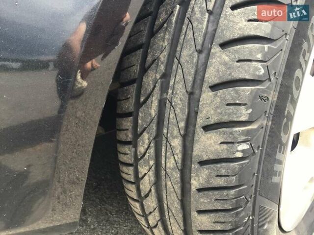 Черный Опель Корса, объемом двигателя 1.23 л и пробегом 208 тыс. км за 5000 $, фото 16 на Automoto.ua