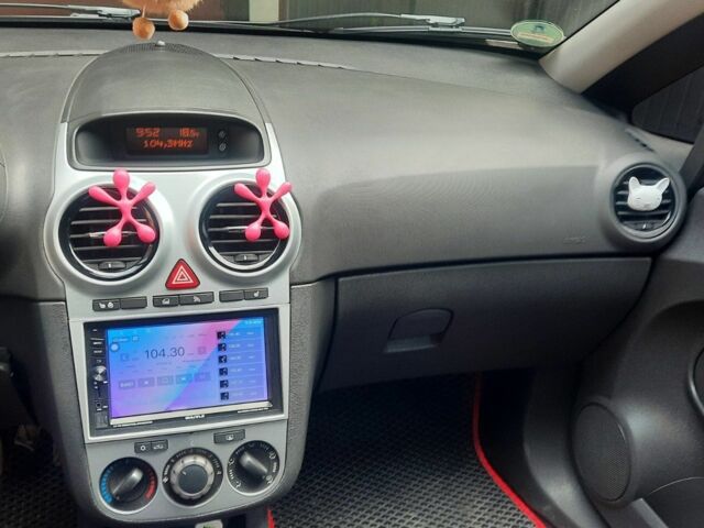 Опель Корса 2012 в Чернигове на Automoto.ua Черный Опель Корса, объемом двигателя 1.4 л и пробегом 146 тыс. км за 7100 $, фото 9 на Automoto.ua