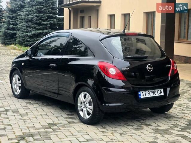 Черный Опель Корса, объемом двигателя 1.25 л и пробегом 134 тыс. км за 3900 $, фото 6 на Automoto.ua