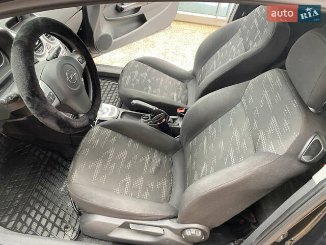 Чорний Опель Корса, об'ємом двигуна 1.23 л та пробігом 120 тис. км за 5999 $, фото 13 на Automoto.ua