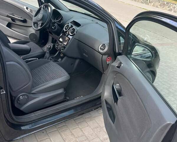 Черный Опель Корса, объемом двигателя 1.2 л и пробегом 125 тыс. км за 6200 $, фото 10 на Automoto.ua