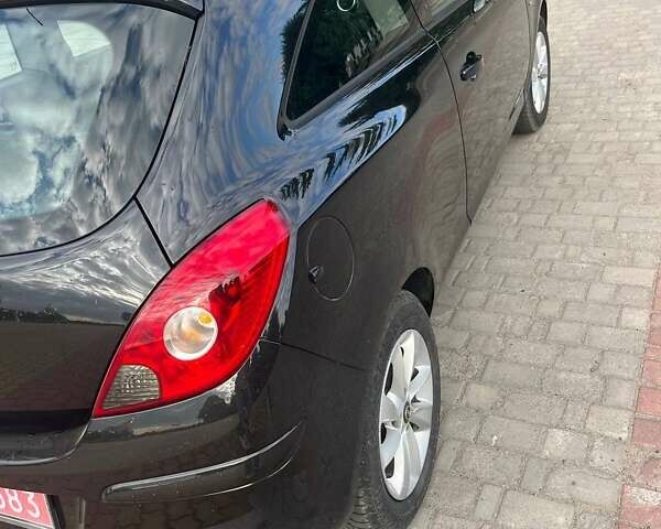 Черный Опель Корса, объемом двигателя 1.2 л и пробегом 125 тыс. км за 6200 $, фото 6 на Automoto.ua