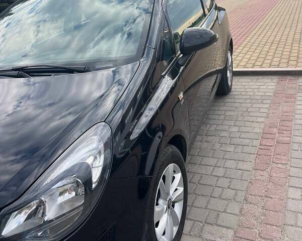 Черный Опель Корса, объемом двигателя 1.2 л и пробегом 125 тыс. км за 6200 $, фото 1 на Automoto.ua