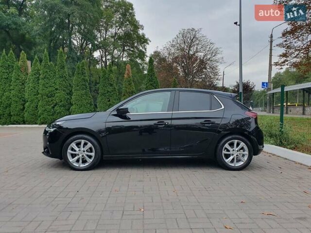 Черный Опель Корса, объемом двигателя 1.2 л и пробегом 57 тыс. км за 12599 $, фото 2 на Automoto.ua