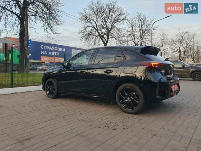 Черный Опель Корса, объемом двигателя 1.2 л и пробегом 9 тыс. км за 14999 $, фото 4 на Automoto.ua