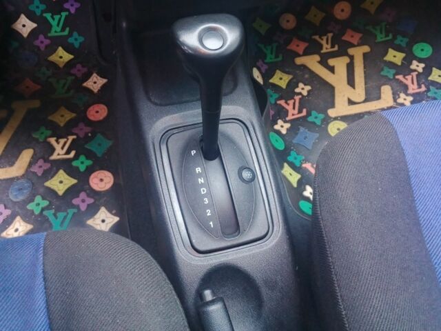 Черный Опель Корса, объемом двигателя 1.2 л и пробегом 234 тыс. км за 2200 $, фото 5 на Automoto.ua