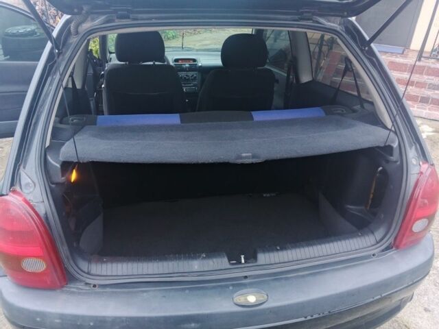 Черный Опель Корса, объемом двигателя 1.2 л и пробегом 234 тыс. км за 2200 $, фото 7 на Automoto.ua