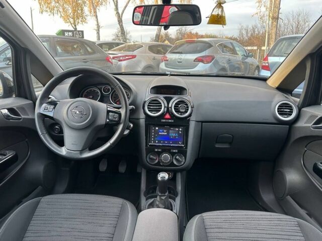 Черный Опель Корса, объемом двигателя 1.2 л и пробегом 126 тыс. км за 5950 $, фото 7 на Automoto.ua