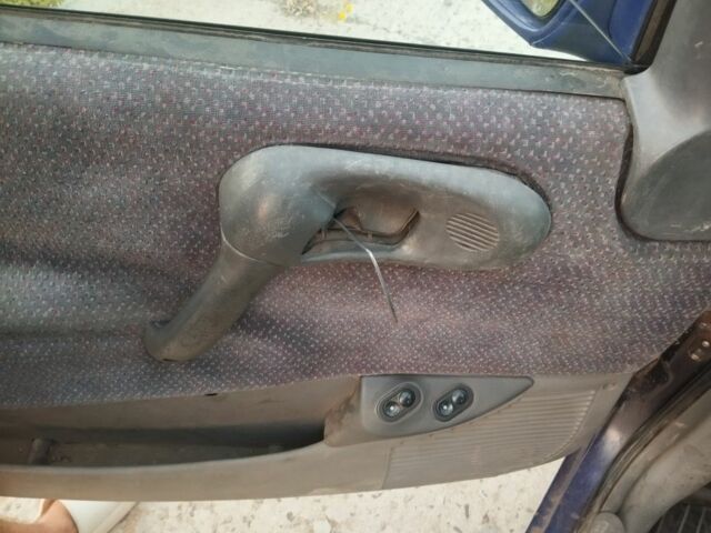 Фиолетовый Опель Корса, объемом двигателя 1.4 л и пробегом 300 тыс. км за 750 $, фото 5 на Automoto.ua