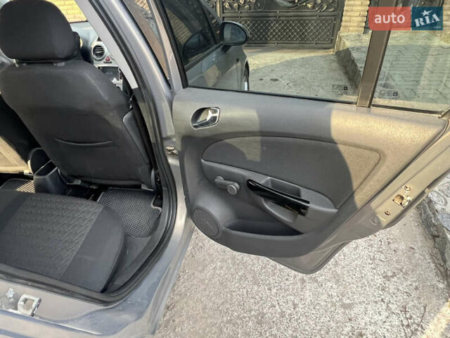 Коричневый Опель Корса, объемом двигателя 1.3 л и пробегом 237 тыс. км за 5700 $, фото 20 на Automoto.ua