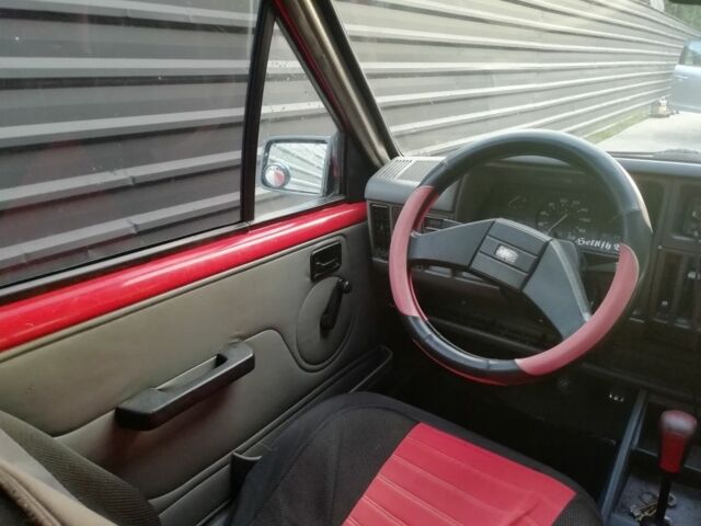 Красный Опель Корса, объемом двигателя 1 л и пробегом 1000 тыс. км за 544 $, фото 5 на Automoto.ua