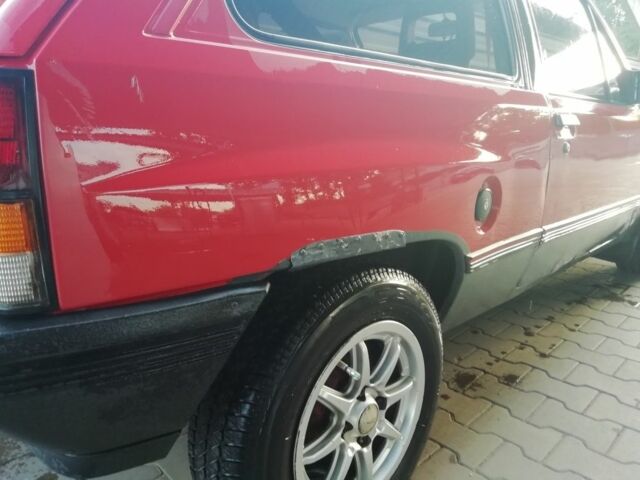 Красный Опель Корса, объемом двигателя 1 л и пробегом 1000 тыс. км за 544 $, фото 2 на Automoto.ua