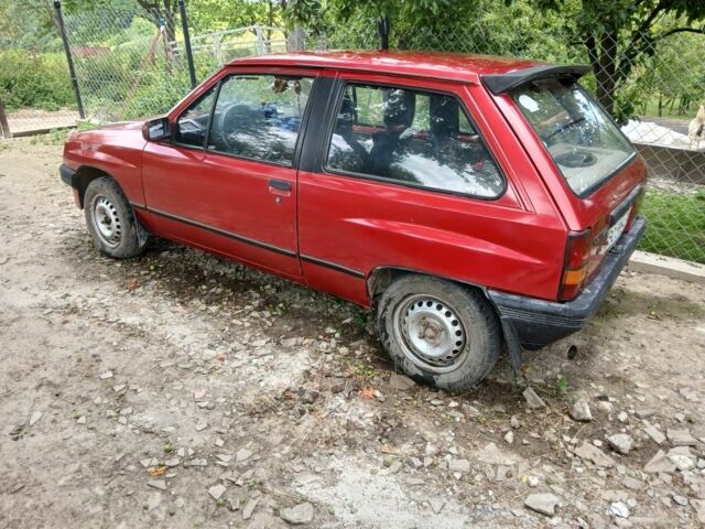 Красный Опель Корса, объемом двигателя 1.2 л и пробегом 3 тыс. км за 381 $, фото 6 на Automoto.ua