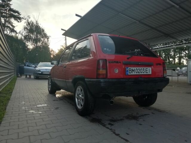 Красный Опель Корса, объемом двигателя 1 л и пробегом 1000 тыс. км за 544 $, фото 8 на Automoto.ua