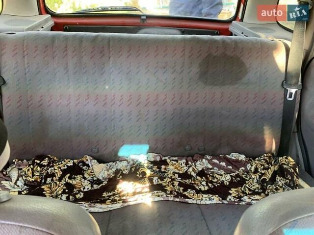 Красный Опель Корса, объемом двигателя 1.2 л и пробегом 285 тыс. км за 1500 $, фото 4 на Automoto.ua