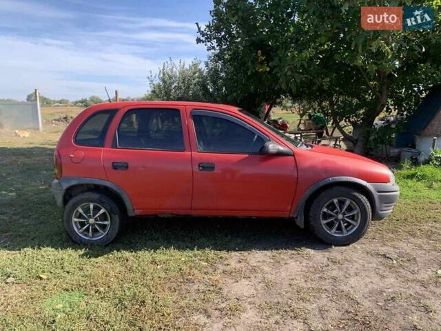 Красный Опель Корса, объемом двигателя 1.2 л и пробегом 285 тыс. км за 1500 $, фото 8 на Automoto.ua