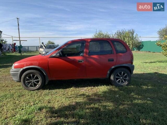 Красный Опель Корса, объемом двигателя 1.2 л и пробегом 285 тыс. км за 1500 $, фото 11 на Automoto.ua