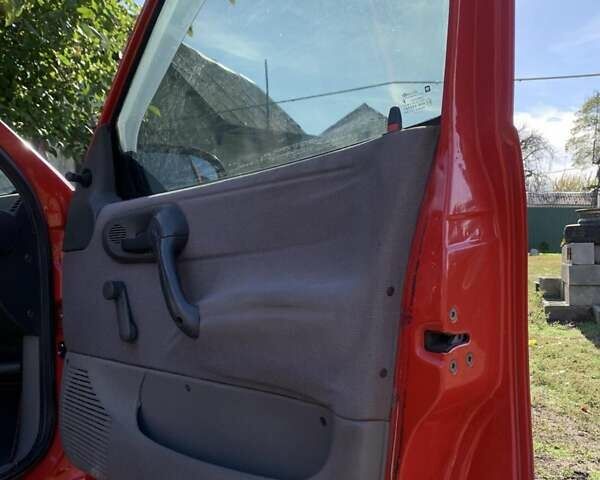 Красный Опель Корса, объемом двигателя 1.2 л и пробегом 285 тыс. км за 1500 $, фото 1 на Automoto.ua