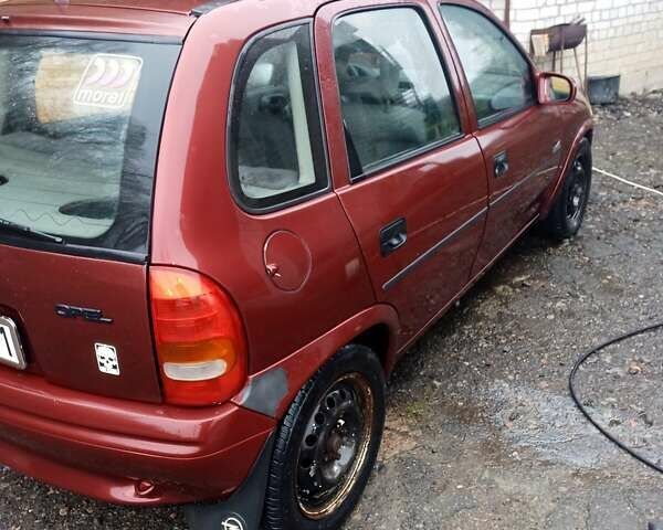Красный Опель Корса, объемом двигателя 1.4 л и пробегом 140 тыс. км за 700 $, фото 5 на Automoto.ua
