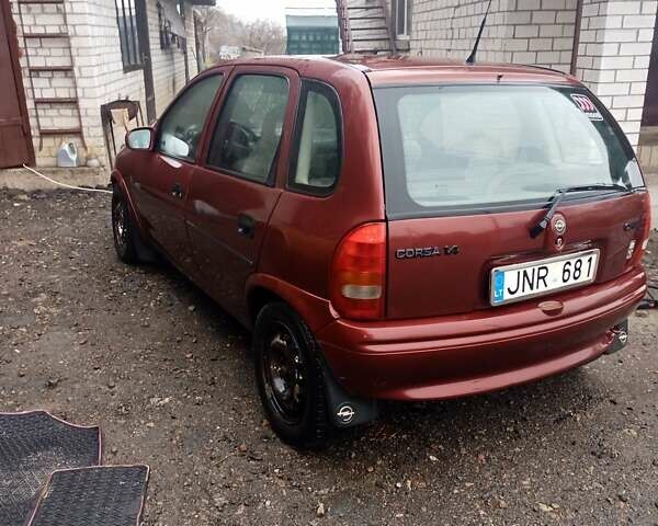 Красный Опель Корса, объемом двигателя 1.4 л и пробегом 140 тыс. км за 700 $, фото 6 на Automoto.ua