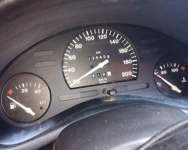 Красный Опель Корса, объемом двигателя 1.4 л и пробегом 140 тыс. км за 700 $, фото 8 на Automoto.ua