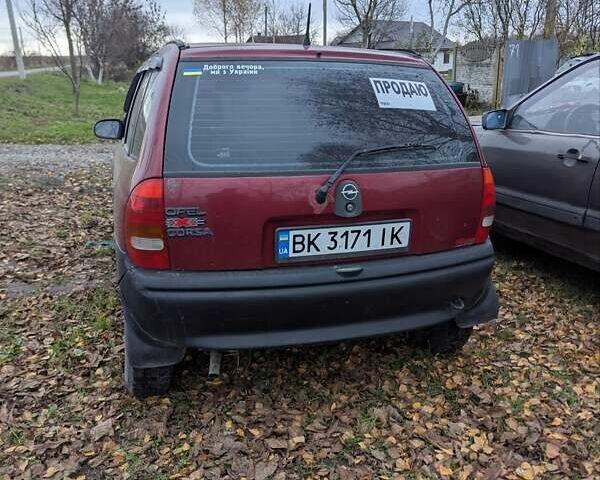 Красный Опель Корса, объемом двигателя 1.2 л и пробегом 350 тыс. км за 900 $, фото 2 на Automoto.ua