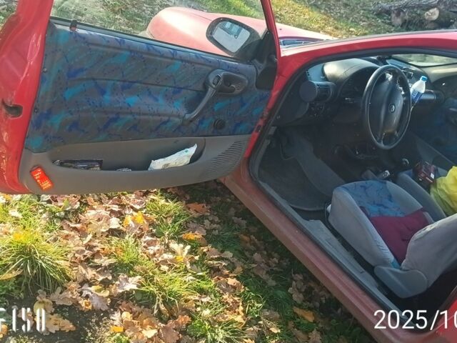 Красный Опель Корса, объемом двигателя 1.2 л и пробегом 222 тыс. км за 1318 $, фото 5 на Automoto.ua