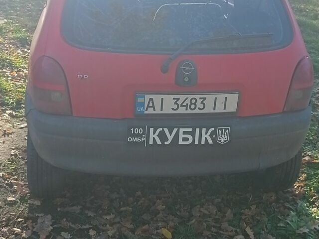 Красный Опель Корса, объемом двигателя 1.2 л и пробегом 222 тыс. км за 1318 $, фото 4 на Automoto.ua