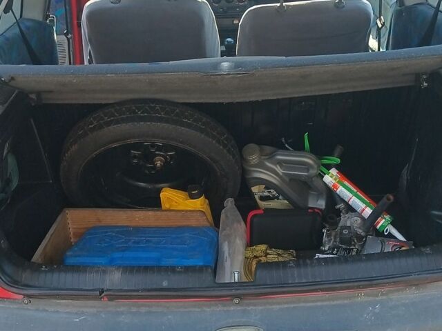 Красный Опель Корса, объемом двигателя 1.2 л и пробегом 222 тыс. км за 1318 $, фото 7 на Automoto.ua