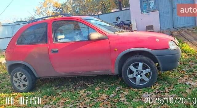 Красный Опель Корса, объемом двигателя 1.2 л и пробегом 140 тыс. км за 1400 $, фото 5 на Automoto.ua