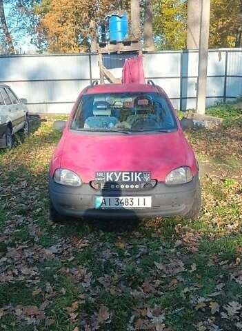 Красный Опель Корса, объемом двигателя 1.2 л и пробегом 140 тыс. км за 1400 $, фото 6 на Automoto.ua