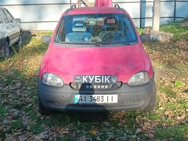 Красный Опель Корса, объемом двигателя 1.2 л и пробегом 222 тыс. км за 1318 $, фото 1 на Automoto.ua