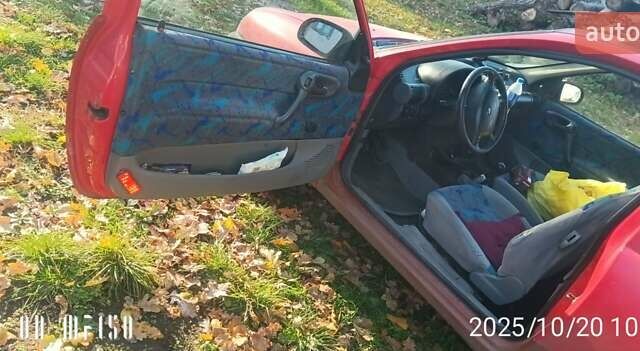 Красный Опель Корса, объемом двигателя 1.2 л и пробегом 140 тыс. км за 1400 $, фото 4 на Automoto.ua