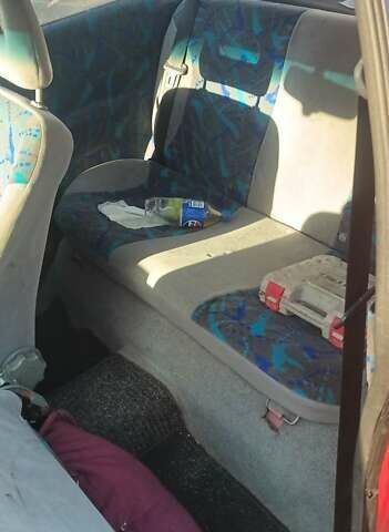 Красный Опель Корса, объемом двигателя 1.2 л и пробегом 222 тыс. км за 1318 $, фото 7 на Automoto.ua