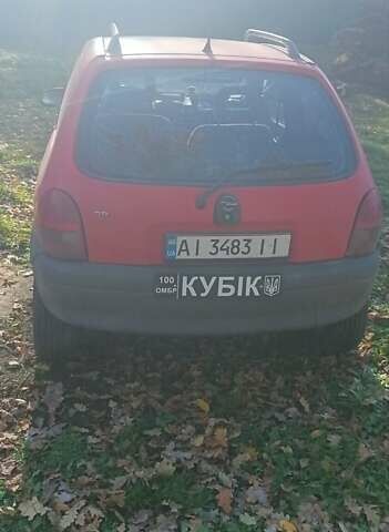 Красный Опель Корса, объемом двигателя 1.2 л и пробегом 140 тыс. км за 1400 $, фото 3 на Automoto.ua
